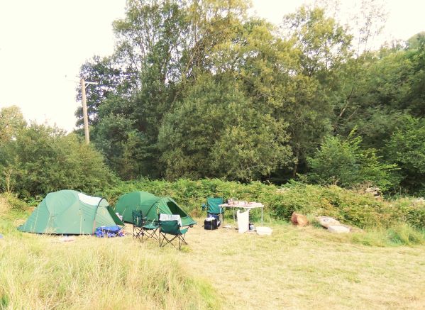 Blue pitch with small hike tent