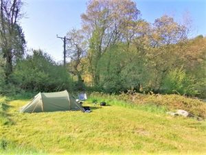 Blue pitch with small hike tent