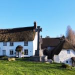 View across Lustleigh village green to Pound Cottages