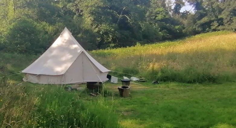 Bell tent in Hay Meadow field on the campsite