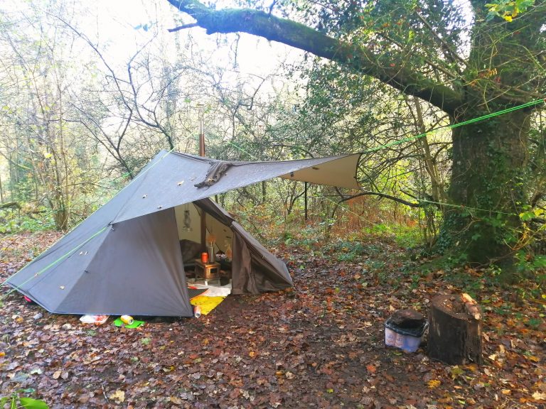 Small tipi style one person tent in the woods