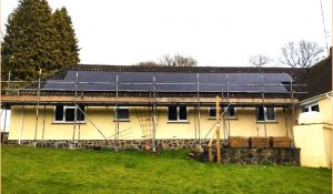 solar panels and scaffolding on a rainy day