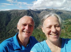 Selfie of Kevin and Michelle with a view of mountains in the Peneda Geres National Park in Portugal 