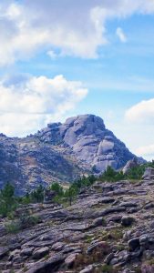 A granite outcropor tor which looks like a craggy face